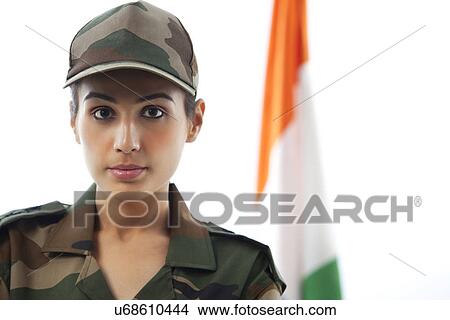 Close-up of female soldier in front of Indian flag View Large Photo Image Picture - Close-up of female soldier in front of Indian flag . Fotosearch