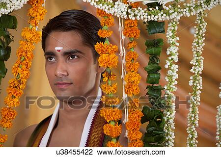 Close-up of groom lost in thoughts View Large Photo Image Stock Image - Close-up of groom lost in thoughts . Fotosearch