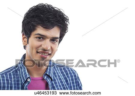 Stock Image - Close-up of smiling young man . Fotosearch