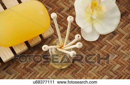 Close-up of soap, reed diffuser and orchid View Large Photo Image Stock Image - Close-up of soap, reed diffuser and orchid . Fotosearch