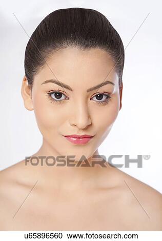 Stock Image - Close-up portrait of a beautiful woman . Fotosearch