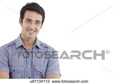 Close-up portrait of man smiling over white background View Large Photo Image Stock Image - Close-up portrait of man smiling over white background . Fotosearch