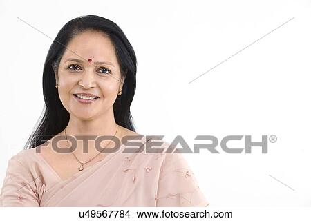Close-up portrait of smiling mature woman View Large Photo Image Picture - Close-up portrait of smiling mature woman . Fotosearch