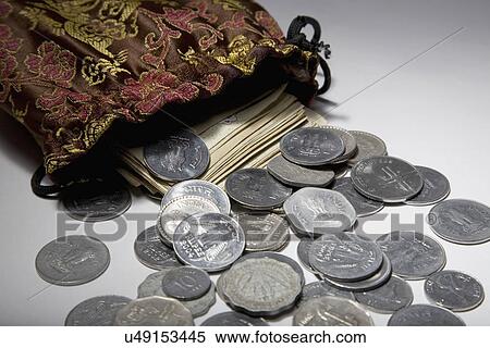 Stock Photography - Coins and currency notes . Fotosearch