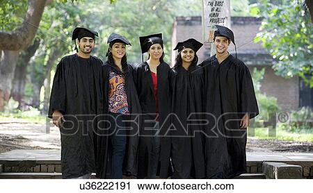 Stock Image - College students at graduation ceremony . Fotosearch