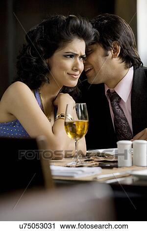 Stock Image - Couple dining together . Fotosearch