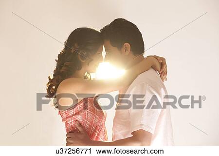 Couple embracing each other View Large Photo Image Stock Image - Couple embracing each other. Fotosearch