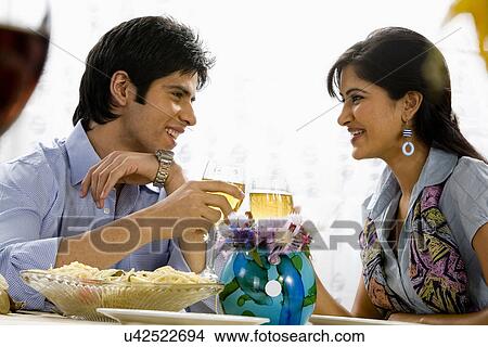 Couple Enjoying a Meal View Large Photo Image Picture - Couple Enjoying a Meal . Fotosearch