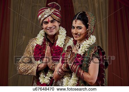 Couple greeting on their weeding day View Large Photo Image Stock Image - Couple greeting on their weeding day . Fotosearch