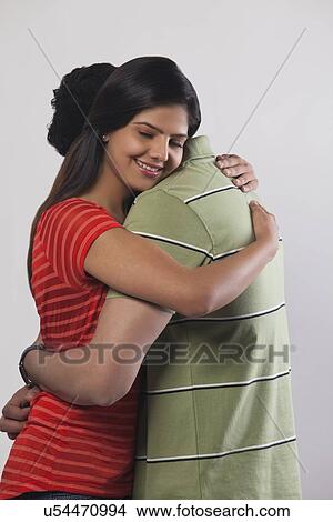 Couple hugging each other View Large Photo Image Picture - Couple hugging each other. Fotosearch