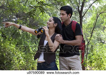 Stock Photo - Couple in a park . Fotosearch