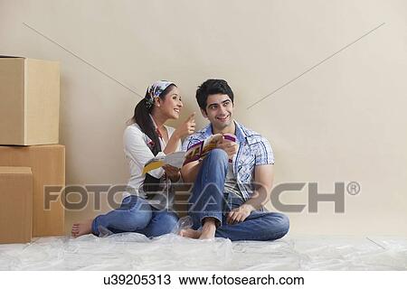 Couple in their new house View Large Photo Image Stock Image - Couple in their new house . Fotosearch