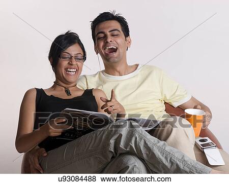 Couple laughing View Large Photo Image Stock Photo - Couple laughing . Fotosearch