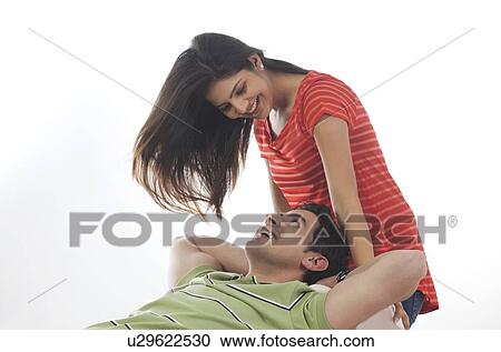Stock Image - Couple looking at each other. Fotosearch