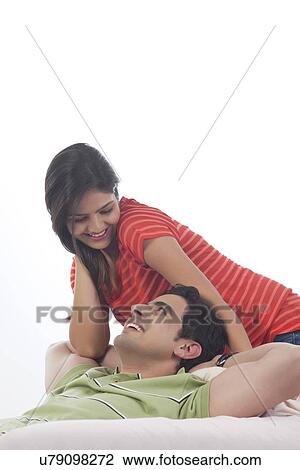 Stock Image - Couple looking at each other. Fotosearch
