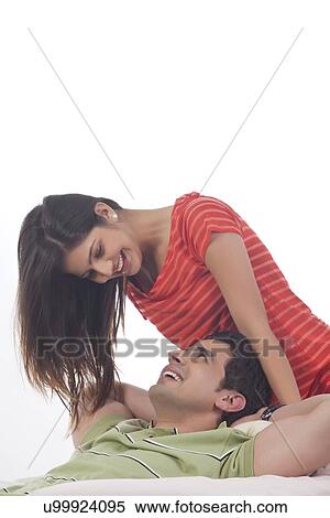 Stock Photography - Couple looking at each other. Fotosearch