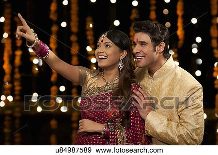 Stock Photo - Couple looking. Fotosearch