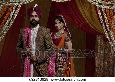 Stock Photo - Couple on their wedding day . Fotosearch