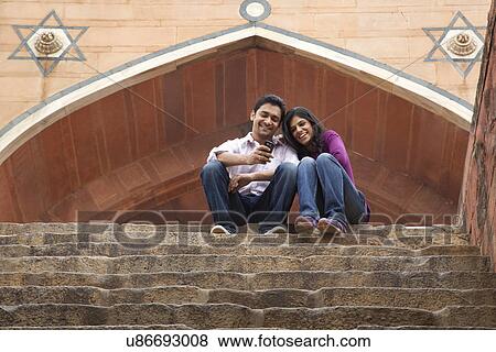 Couple sitting on the steps of Humanyuns Tomb View Large Photo Image Stock Photo - Couple sitting on the steps of Humanyuns Tomb . Fotosearch