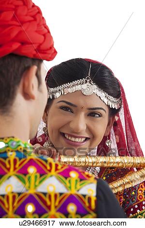 Couple with sticks dancing View Large Photo Image Stock Photo - Couple with sticks dancing . Fotosearch