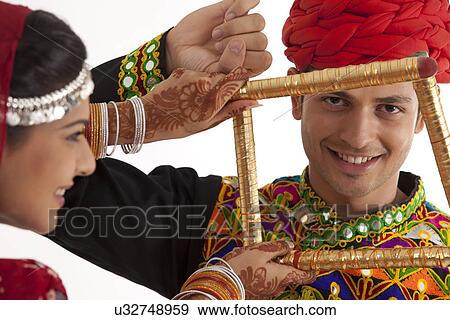 Stock Photo - Couple with sticks dancing . Fotosearch