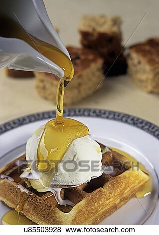 Dessert being served View Large Photo Image Stock Photo - Dessert being served . Fotosearch