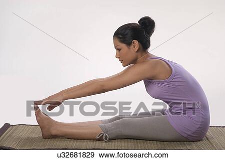 Stock Photo - Doing yoga . Fotosearch