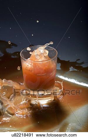 Stock Image - Drink splashing . Fotosearch