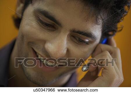 Executive talking on microphone View Large Photo Image Stock Photograph - Executive talking on microphone . Fotosearch