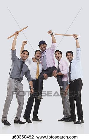 Executives cheering during cricket match View Large Photo Image Stock Image - Executives cheering during cricket match . Fotosearch