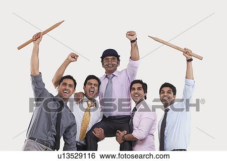 Executives cheering during cricket match View Large Photo Image Stock Photograph - Executives cheering during cricket match . Fotosearch