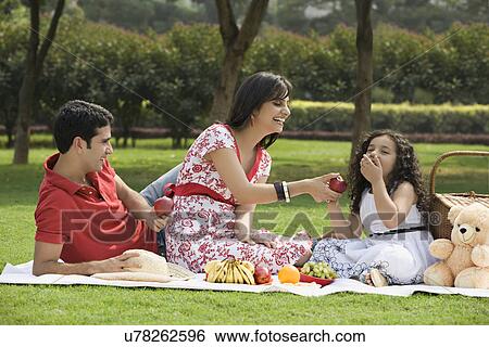 Stock Photograph - Family at a picnic . Fotosearch