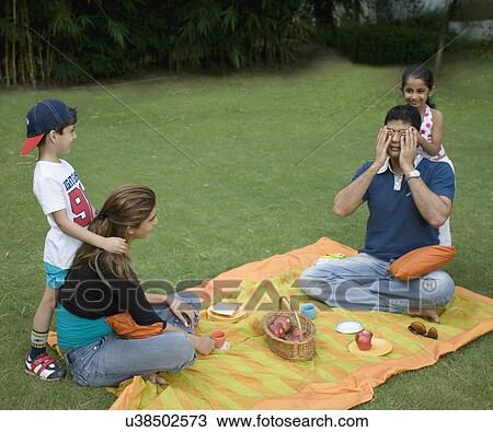 Family at picnic View Large Photo Image Stock Image - Family at picnic . Fotosearch
