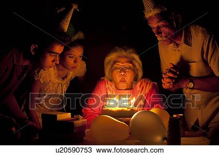 Family celebrating birthday View Large Photo Image Stock Image - Family celebrating birthday. Fotosearch