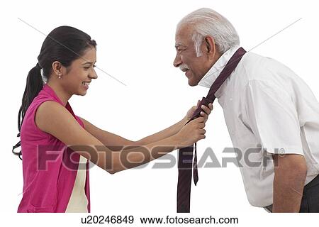 Stock Photo - Family celebrating birthday. Fotosearch