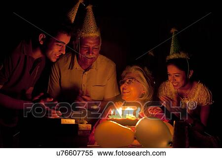 Family celebrating birthday View Large Photo Image Stock Photography - Family celebrating birthday. Fotosearch