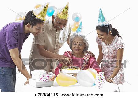 Family celebrating birthday View Large Photo Image Stock Photography - Family celebrating birthday. Fotosearch
