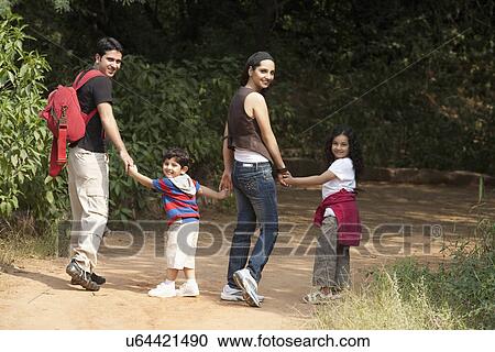 Family in a park View Large Photo Image Stock Image - Family in a park . Fotosearch