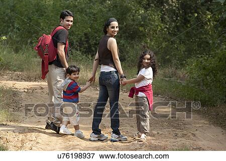 Stock Photo - Family in a park . Fotosearch