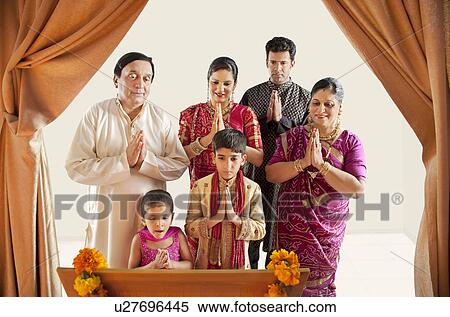 Family praying View Large Photo Image Stock Photography - Family praying . Fotosearch