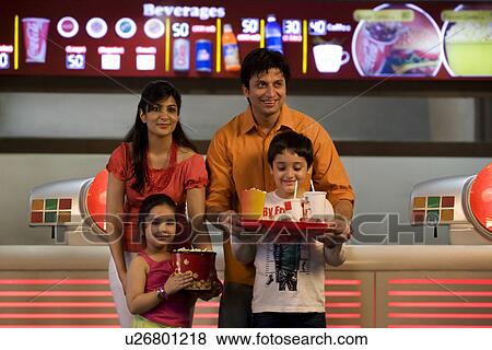 Family with cola and popcorn View Large Photo Image Stock Photo - Family with cola and popcorn . Fotosearch