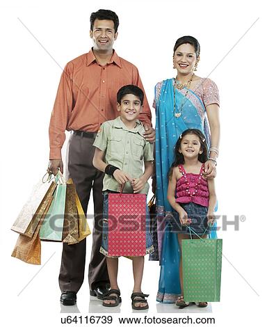 Stock Photo - Family with shopping bags . Fotosearch