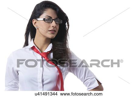 Picture - Fashionable businesswoman with windswept tie over white background. Fotosearch