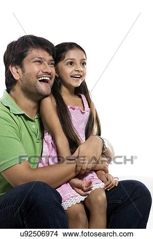 Father and daughter enjoying View Large Photo Image Picture - Father and daughter enjoying . Fotosearch