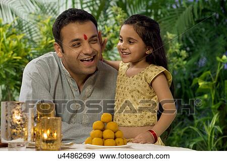 Father and daughter enjoying themselves View Large Photo Image Stock Photo - Father and daughter enjoying themselves . Fotosearch