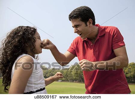 Father and daughter playing View Large Photo Image Stock Photo - Father and daughter playing . Fotosearch
