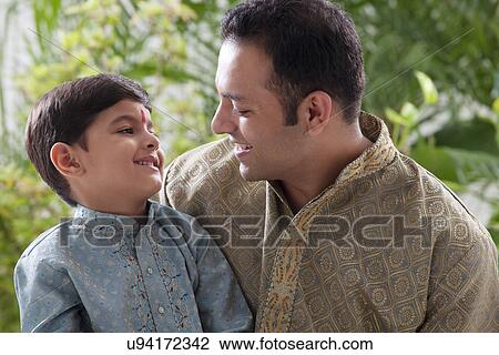 Father and son smiling View Large Photo Image Stock Image - Father and son smiling . Fotosearch