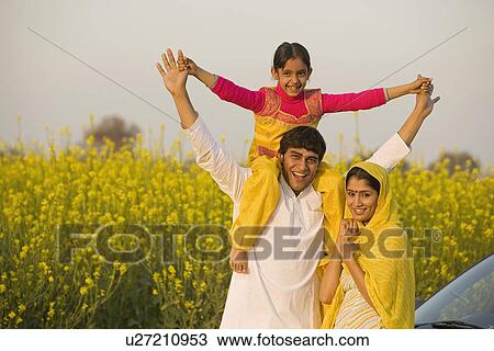 Father with daughter on his shoulders View Large Photo Image Stock Image - Father with daughter on his shoulders . Fotosearch