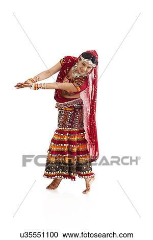 Female dandiya dancer dancing View Large Photo Image Stock Image - Female dandiya dancer dancing . Fotosearch