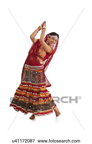 Female dandiya dancer dancing View Large Photo Image Stock Photo - Female dandiya dancer dancing . Fotosearch